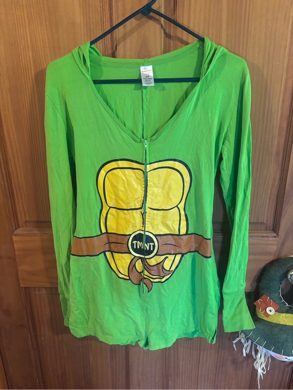 Nickelodeon Green TMNT Hooded Zip-Up onesie with Yellow Shell Graphic